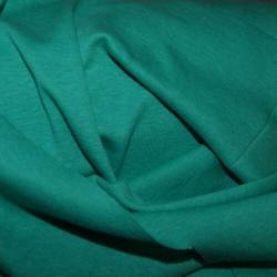 Nieuw nog op de rol groen ,t-shirt stof is rond gebreid .