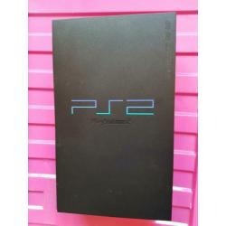 Playstation 2 met diverse spellen en toebehoren