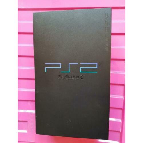 Playstation 2 met diverse spellen en toebehoren