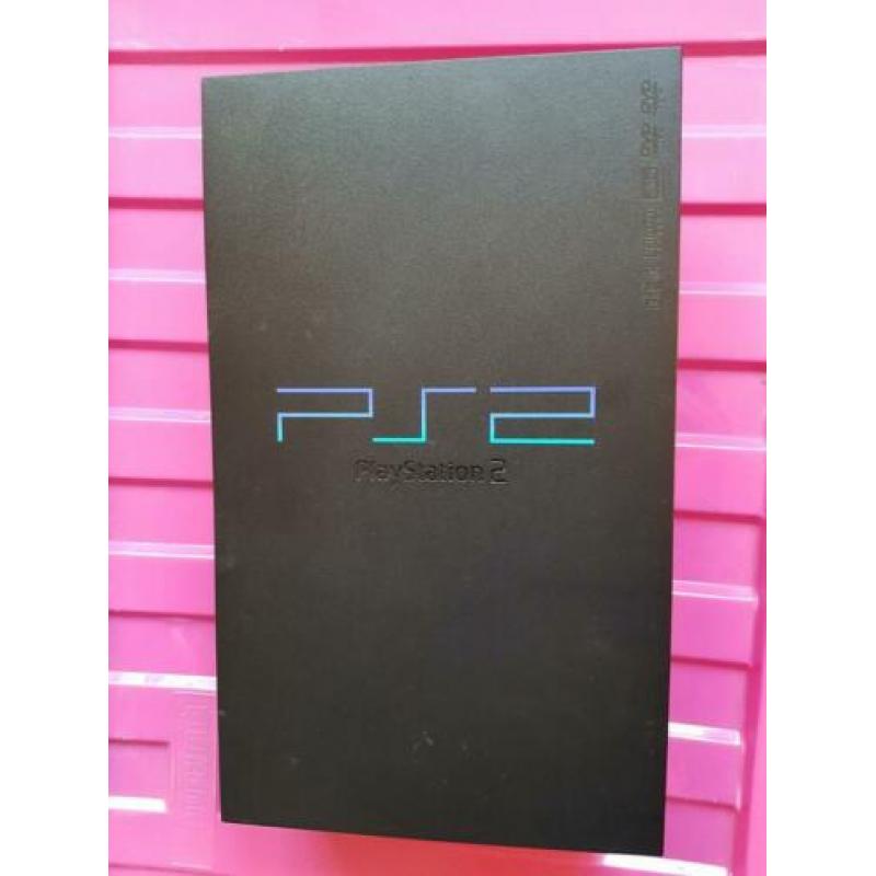 Playstation 2 met diverse spellen en toebehoren