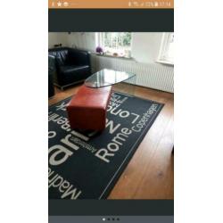 Design salontafel glas en leer