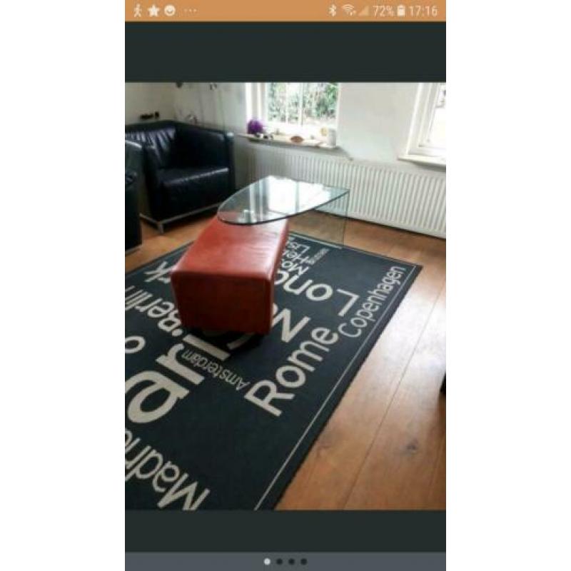 Design salontafel glas en leer
