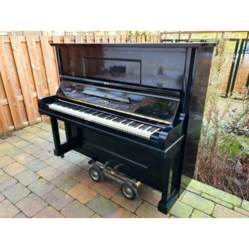 Gereviseerde zwarte Leutke piano.