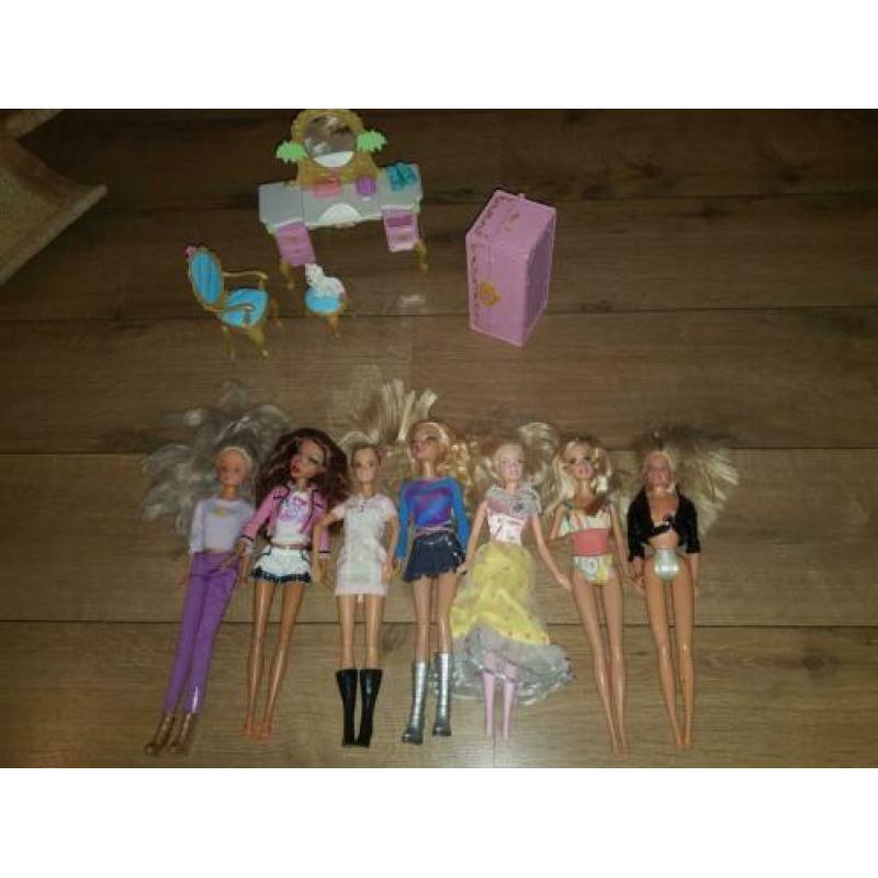 7 barbies enz...