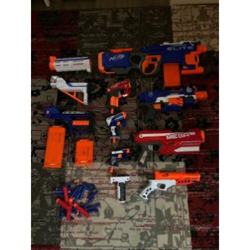 7 Nerf geweren waarvan 1 automaat + accessoires in 1 koop