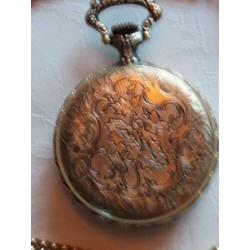 Zakhorloge met 2 paardenhoofden