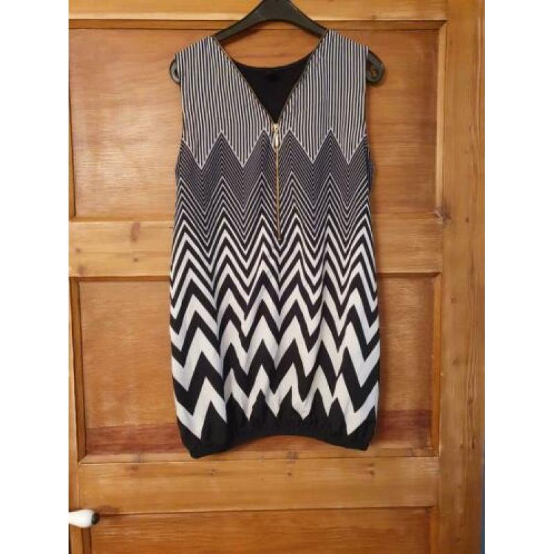 Mooie zwart/witte top met leuke details van Love2wait, mt M