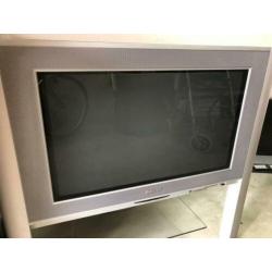 Philips beeldbuid / breedbeeld tv + glazen meubel