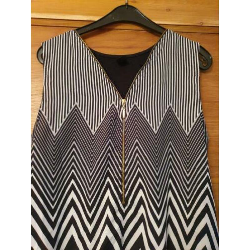 Mooie zwart/witte top met leuke details van Love2wait, mt M