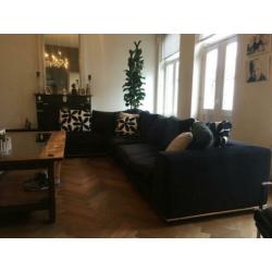 Te koop: zwarte luxe hoekbank