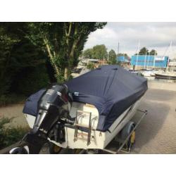 Saver 550 met 115 pk Suzuki 4 takt en Pega trailer