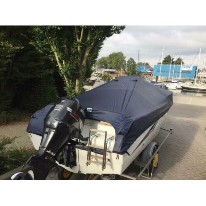 Saver 550 met 115 pk Suzuki 4 takt en Pega trailer