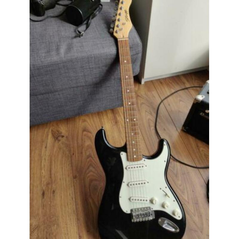 Elektrische gitaar, versterker en hoes
