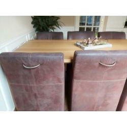 6 x bruine stoelen met leuning en wielen