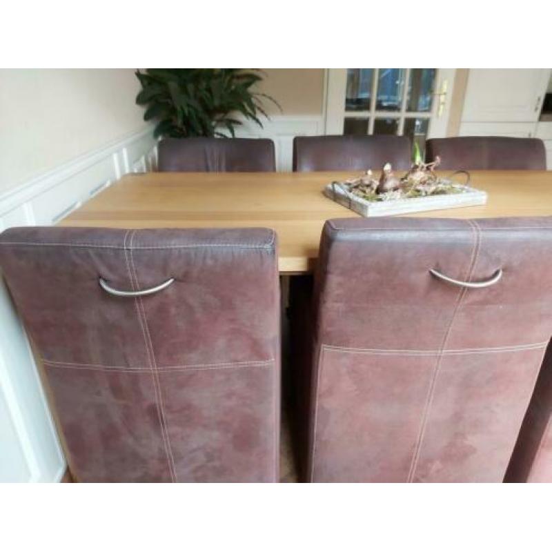 6 x bruine stoelen met leuning en wielen