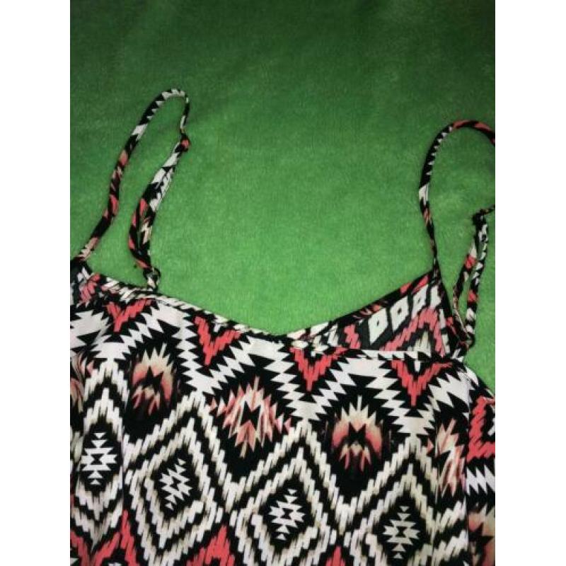 Kleurrijk: blouse. Maat L. ZGAN