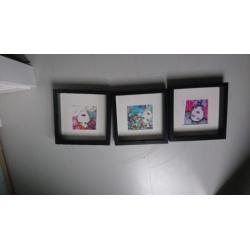 3 ingelijste printen