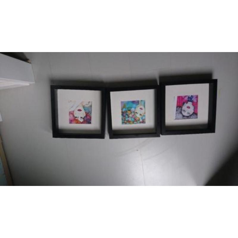 3 ingelijste printen