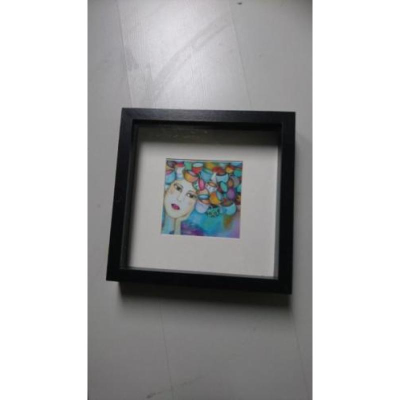 3 ingelijste printen